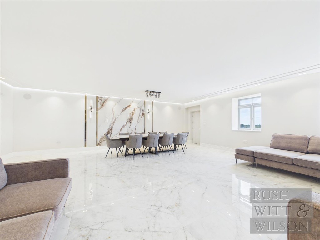 Lot: 100 - WELL PRESENTED DETACHED HOUSE - Living and dining room in another angle 2